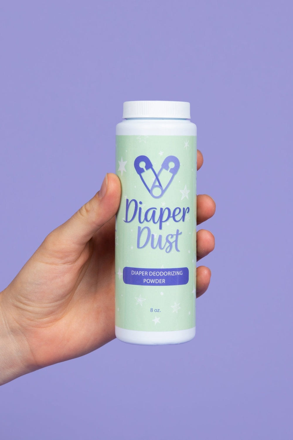 Diaper Dust 8oz bottle for babies, ideal for preventing diaper rash and keeping skin dry and comfortable.