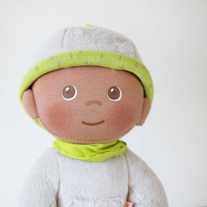 Snug Up Doll Ollie in a cozy pose, perfect for cuddling and comforting your little one.