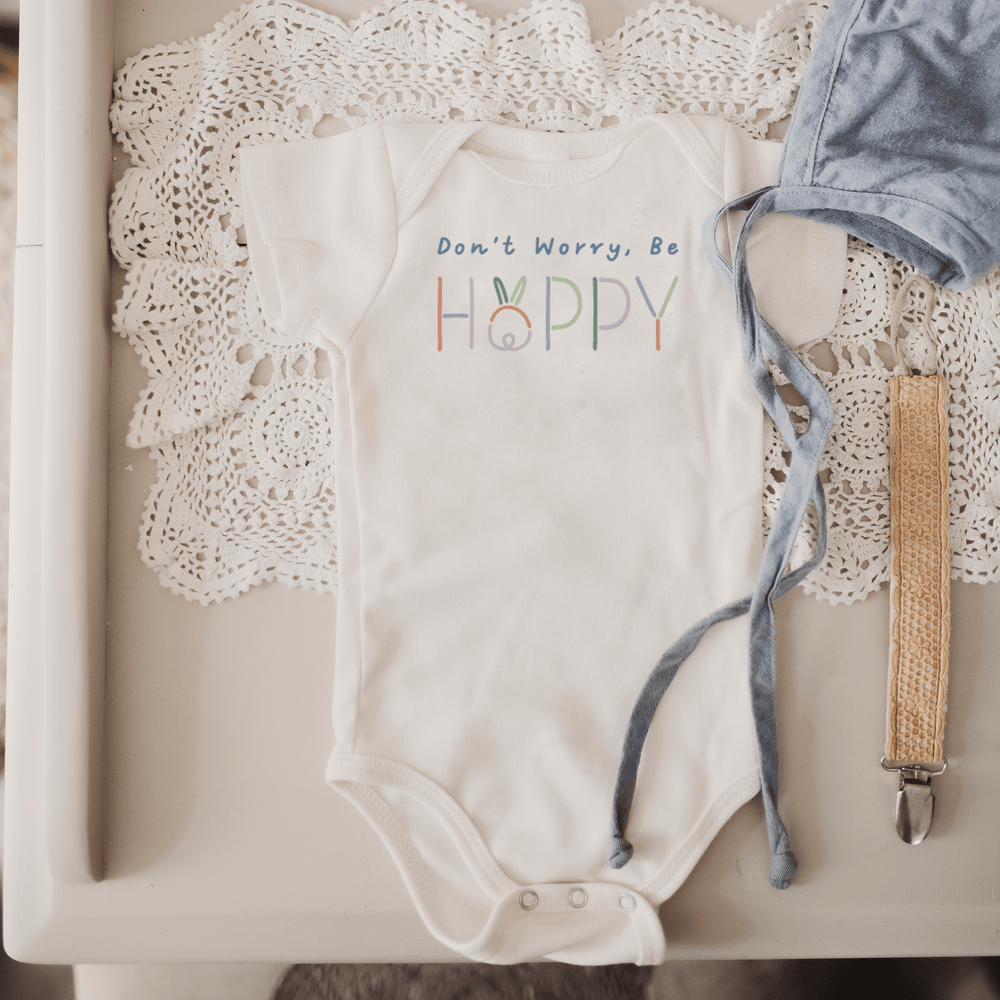 Graphic bodysuit for babies featuring "Don't Worry Be Hoppy" design in a playful short sleeve style.