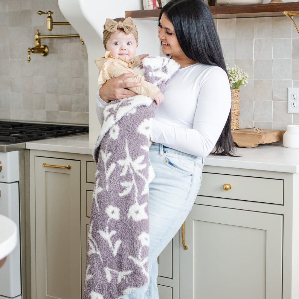 Double-layer Bamboni® receiving blankets for swaddling and comfort, perfect for newborns and infants.