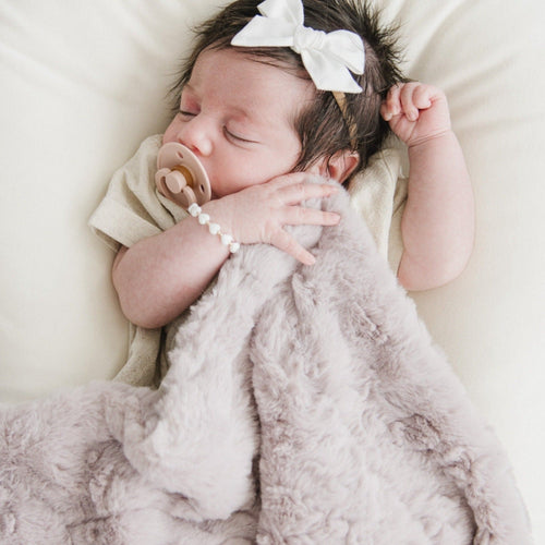 DREAM MINI BLANKETS in soft fabric, perfect for cuddling and comfort for babies, shown from angle 2.