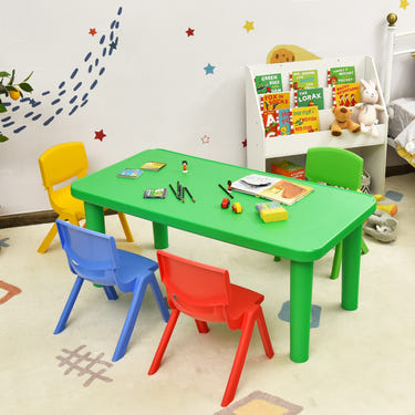 Colorful plastic table and 4 chairs set for kids, perfect for playtime and creative activities.