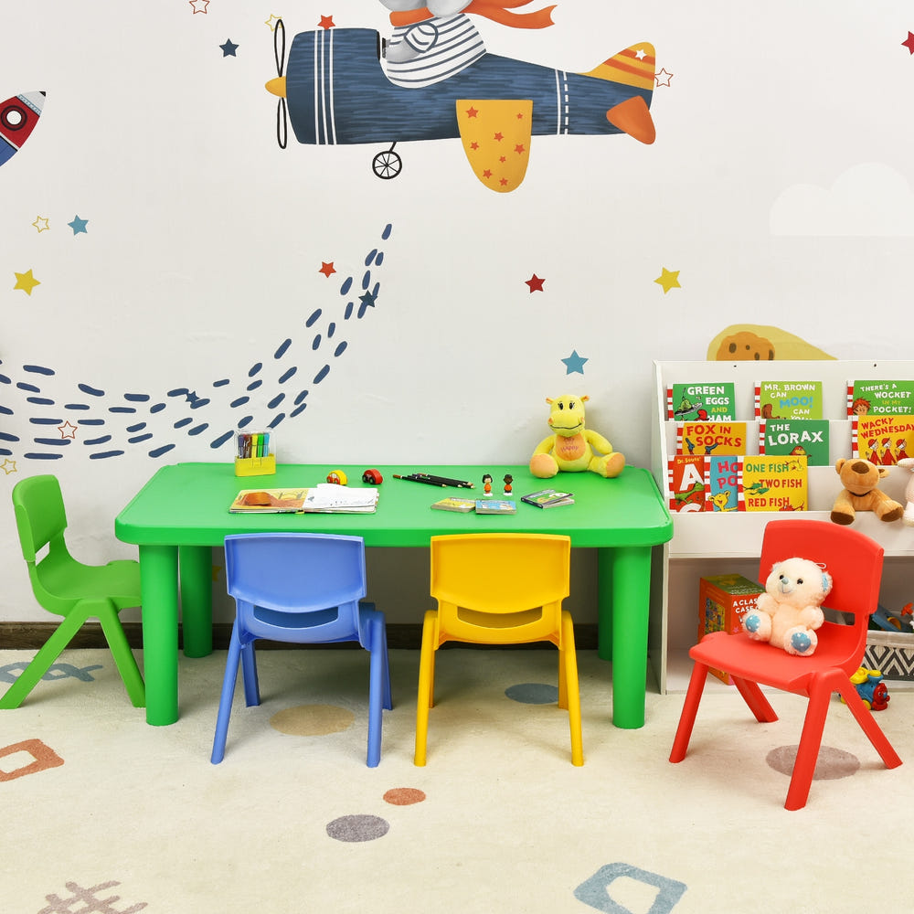 Colorful plastic table and 4 chairs set for kids, perfect for playtime and creative activities.