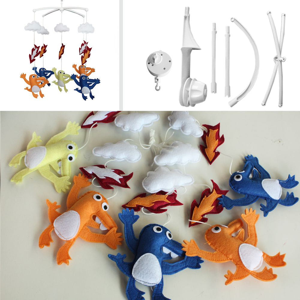 Fire Breathing Monsters Halloween crib mobile for babies, featuring musical and decorative elements for nursery decor.