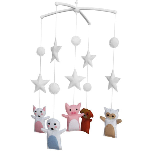 Handmade cute pig dog baby crib mobile for nursery decor, featuring musical elements for kids' rooms.