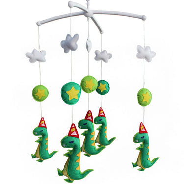Handmade green dinosaur musical mobile for baby crib, perfect nursery decor and baby shower gift.
