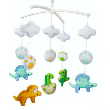 Handmade baby crib musical mobile with colorful dinosaur design for nursery decor and baby shower gift.