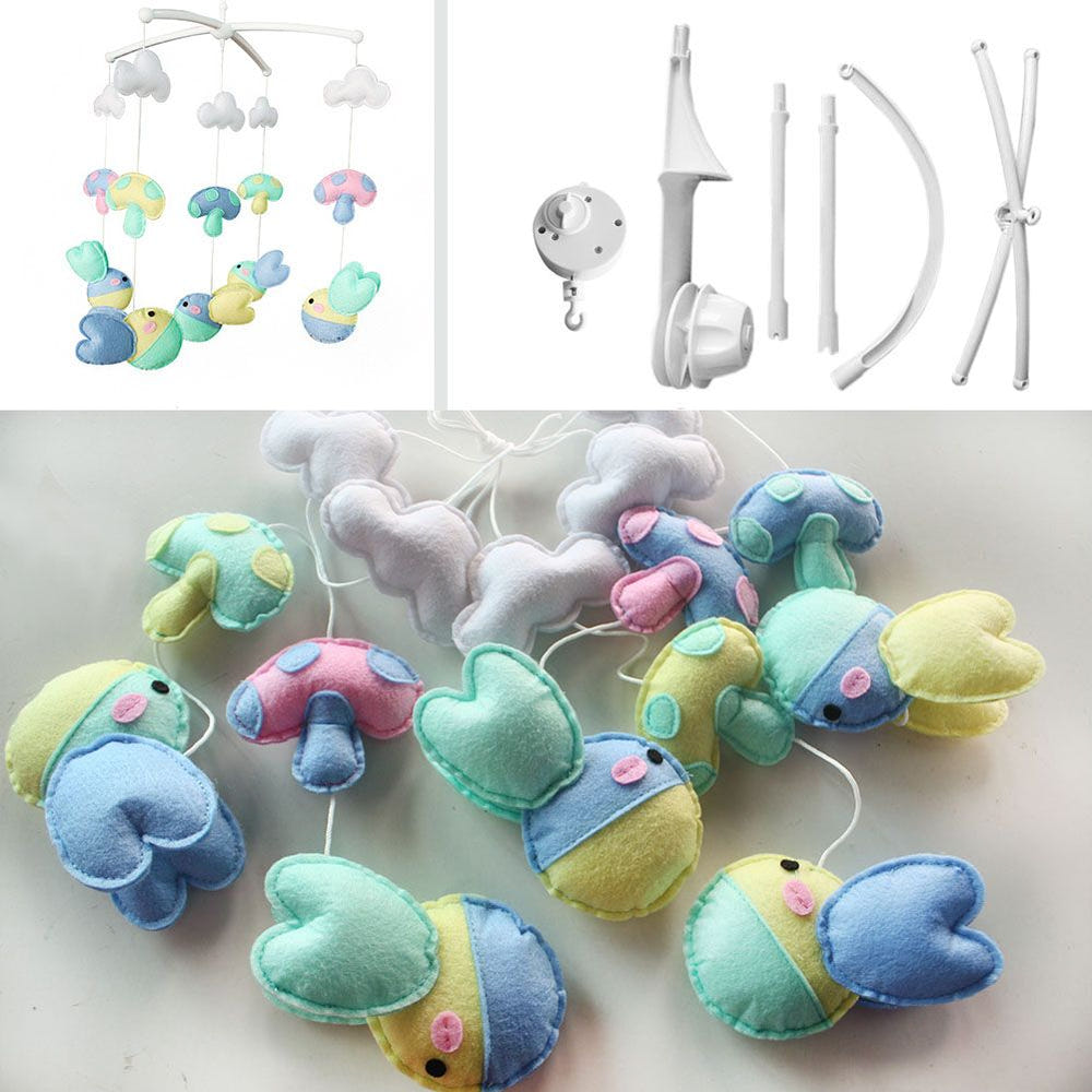 Handmade baby crib mobile with colorful hanging toys, perfect for nursery décor and baby bed accessories.