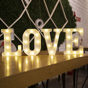 Alphabet LED lights for home decor, perfect for weddings, birthdays, and Christmas parties. Battery-operated night lamp.