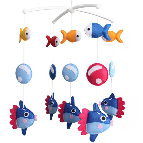 Marine fish crib mobile in blue ocean theme for nursery decor, perfect for baby boys and girls.