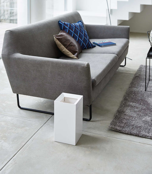 Stylish baby trash can from an angle, perfect for nursery organization and waste disposal.