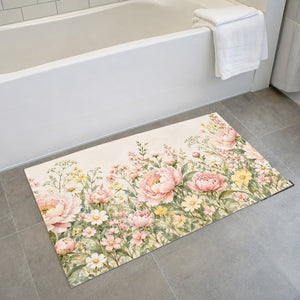 Peony Garden bath mat on the floor in front of the tub