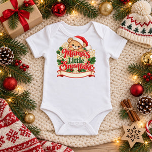Personalize the Mama's Little Snowflake organic cotton baby bodysuit in white with your baby's name