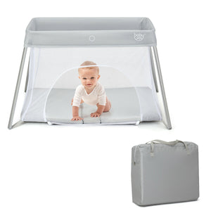 Lightweight foldable baby playpen with carry bag, perfect for safe play and sleep, shown from angle 5.