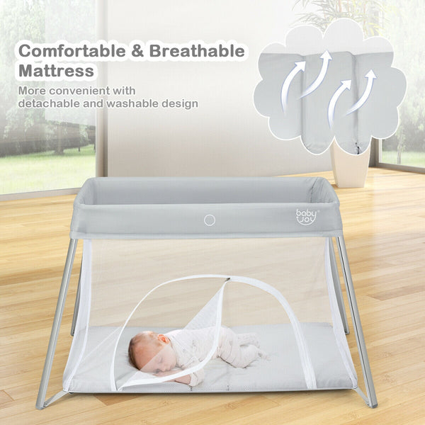 Lightweight foldable baby playpen with carry bag, perfect for safe play and sleep, shown at angle 7.