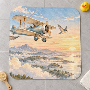 Birds and Biplane kids hooded bath towel laid flat