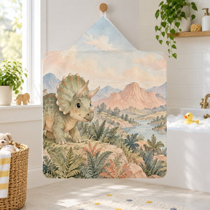 Baby Triceratops Dinosaur kids hooded bath towel hanging in a kids bathroom