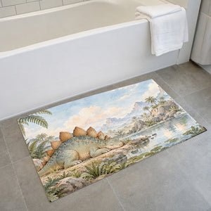 Sleepy Stegosaurus Dinosaur bath mat on the floor in front of the tub