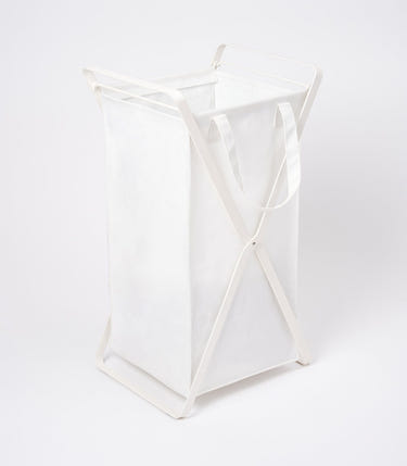 Laundry hamper with cotton liner in two sizes, made of steel and cotton, ideal for organizing baby laundry.