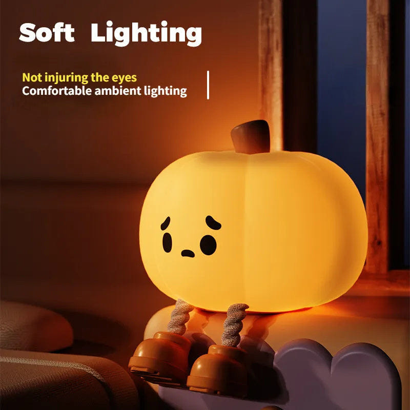 Cute silicone pumpkin night light, dimmable and rechargeable, perfect for kids' Halloween decor and bedside use.