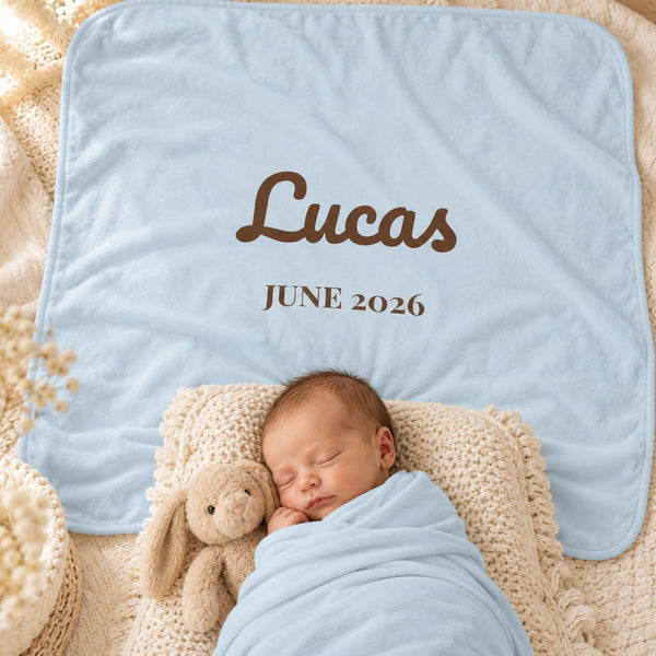 Name and Birth Month swaddle blanket in sky, styled photo 2