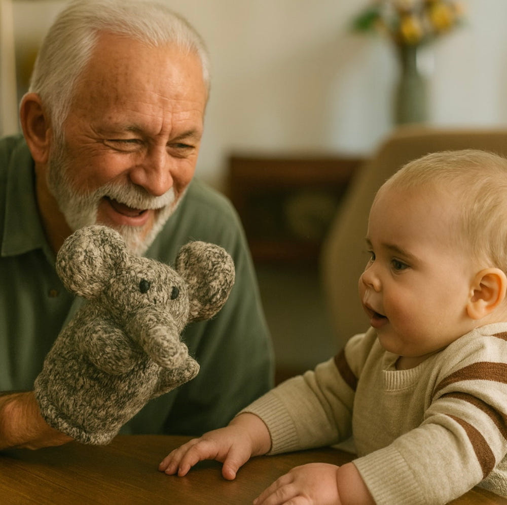 Organic wool knit hand puppet, Elliot the Elephant, perfect for imaginative play and cuddles.