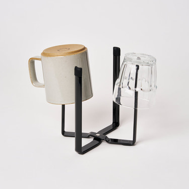 Collapsible steel bottle dryer for babies - compact and efficient drying rack for small spaces.