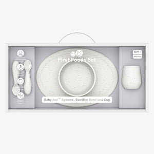 "First Foods Set for babies, featuring colorful bowls and utensils, perfect for introducing solid foods."