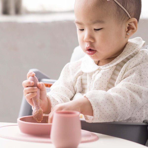 "First Foods Set for babies, featuring colorful bowls and utensils at a 33-degree angle."