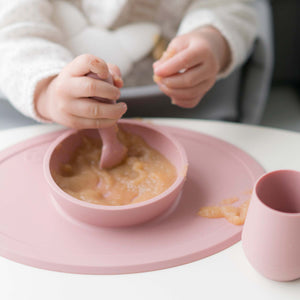"First Foods Set for babies, featuring colorful bowls and spoons, perfect for introducing solids at angle 37."