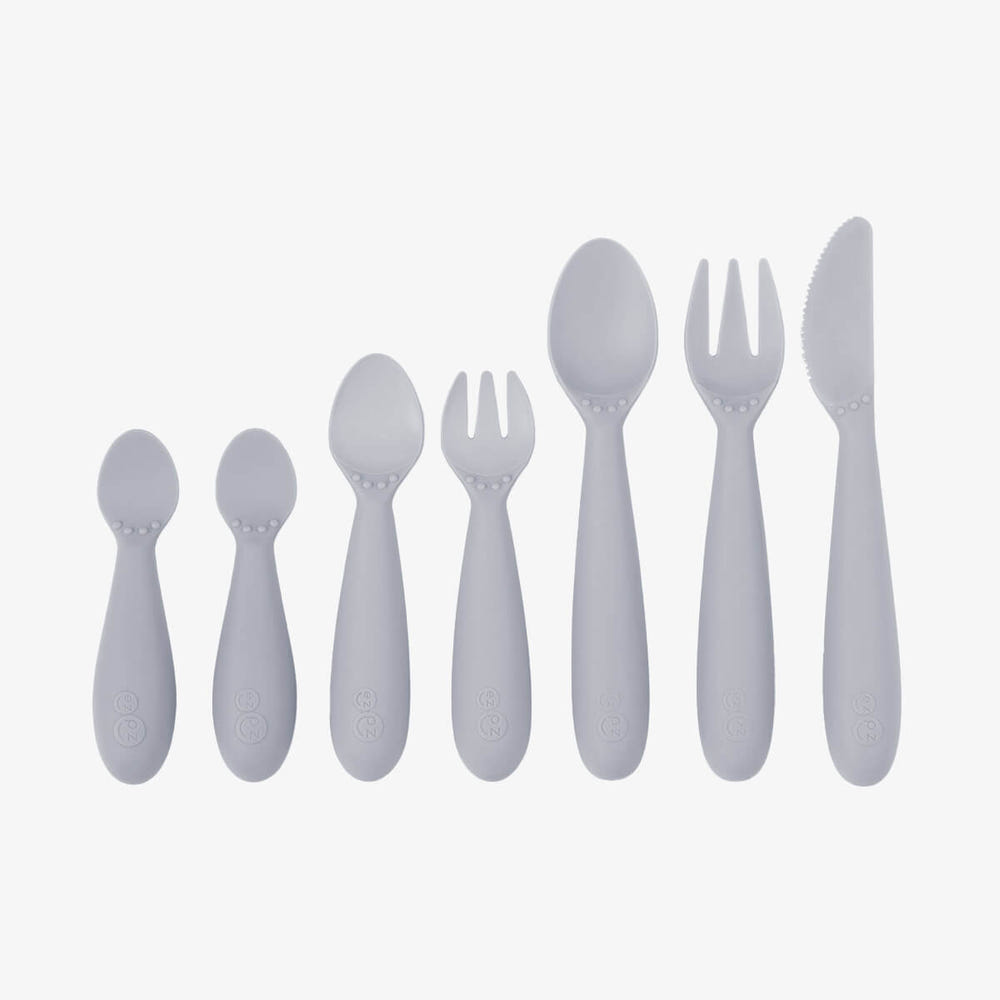 Developmental utensil set for babies, designed for easy grip and self-feeding, perfect for mealtime learning.