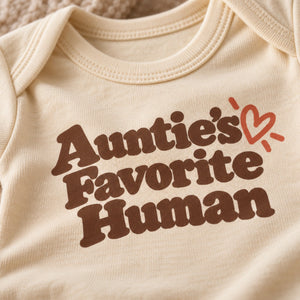 Close-up of the Auntie's Favorite Human baby bodysuit print