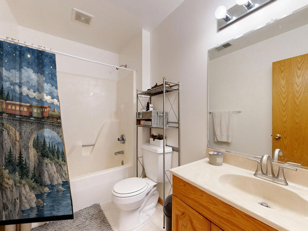 Moonlit Train shower curtain on a tub shower combo in an American family bathroom