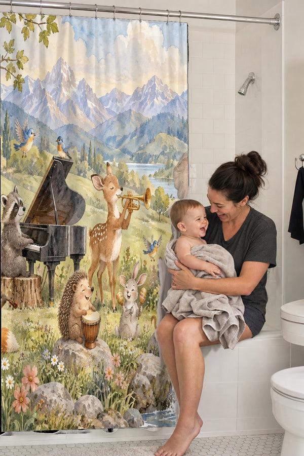 Mom holding her baby on the tub edge next to the Animal Music Festival shower curtain