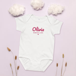 Personalized embroidered baby bodysuit flat lay