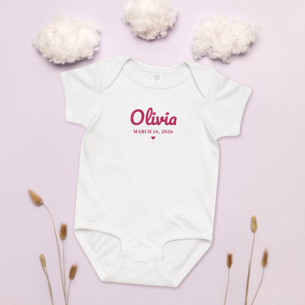 Personalized embroidered baby bodysuit flat lay