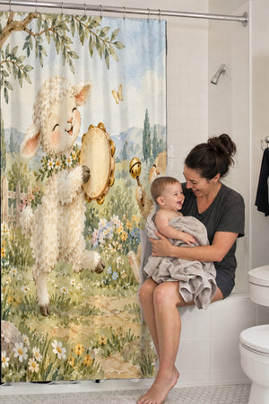 Mom holding her baby on the tub edge next to the Lamb and Bunny Music shower curtain