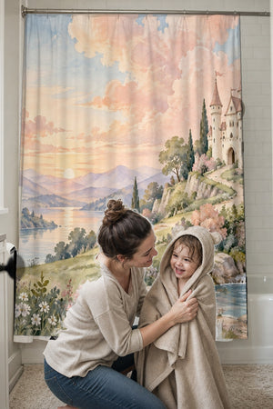 Mom drying her toddler in a hooded towel in front of the Hilltop Castle Fairy Tale shower curtain