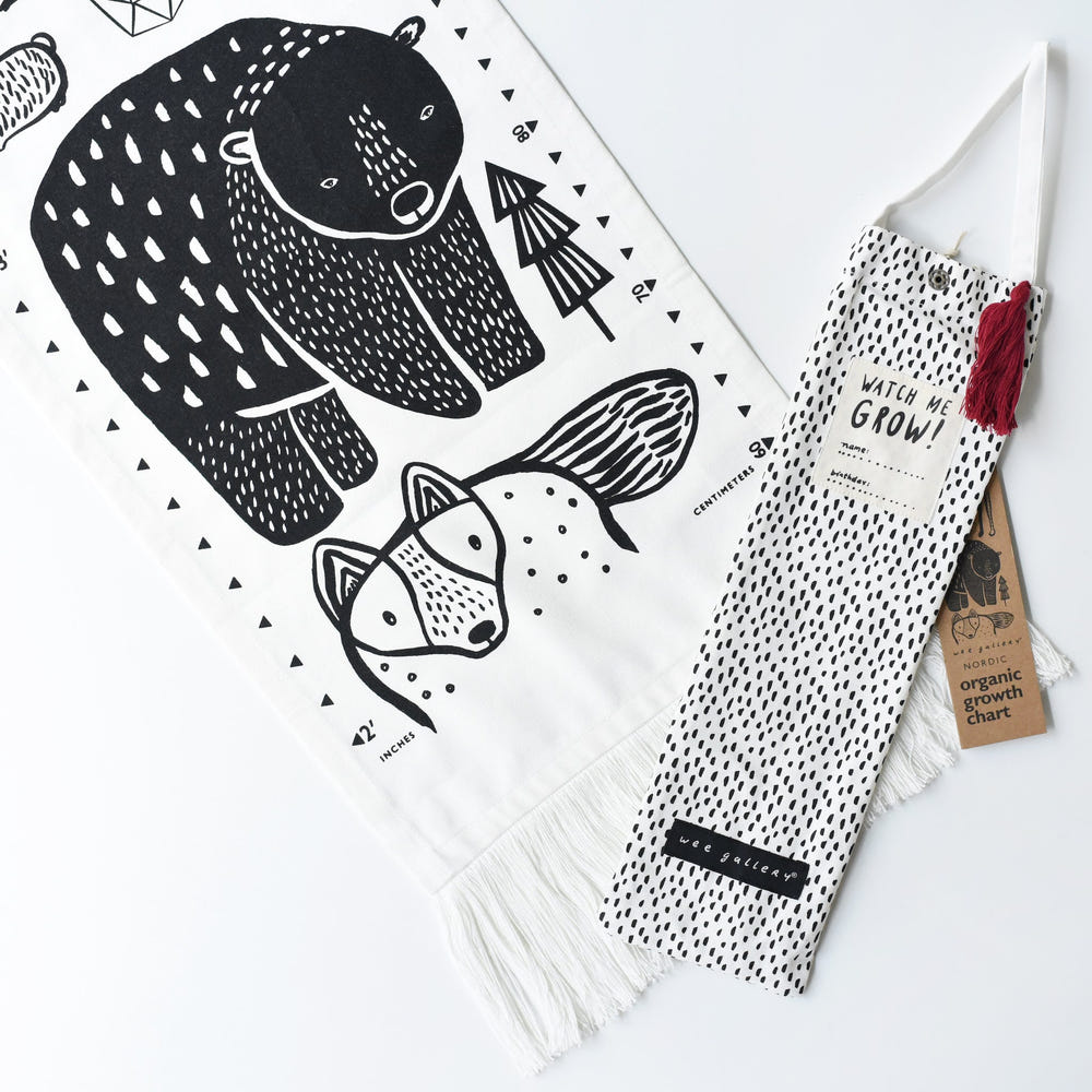 Nordic canvas growth chart for kids' room decor, featuring a stylish and playful design.