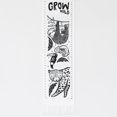 Canvas growth chart featuring a vibrant rainforest design for nursery decor.