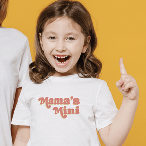 Graphic short sleeve bodysuit from Mama's Mini, featuring playful design and soft fabric for baby comfort.