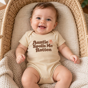 Baby wearing the Auntie Spoils Me Rotten baby bodysuit