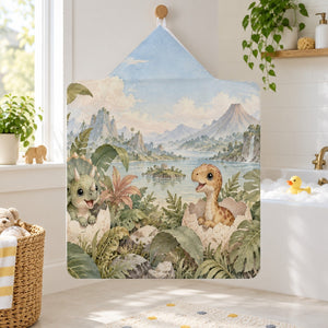 Hatching Dinosaurs kids hooded bath towel hanging in a kids bathroom