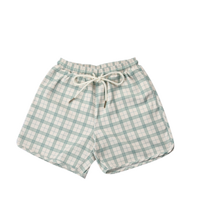 Baby swim trunks in fern plaid, UPF protected and made from recycled materials. Perfect for sunny days!