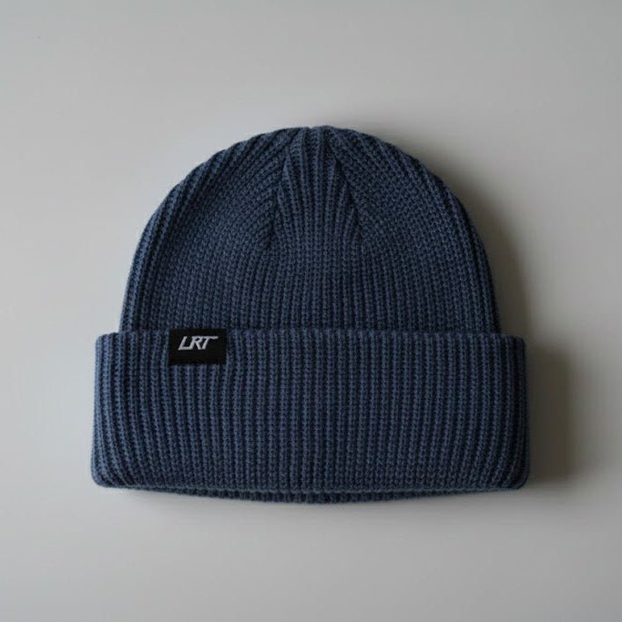 Navy Fisherman Beanie for babies - stylish and cozy apparel accessory.