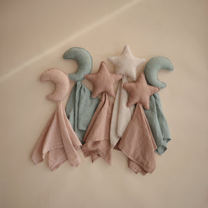 Moon Lovey Blanket in soft fabric, perfect for cuddling and comforting your baby. Angle view showcasing its adorable design.