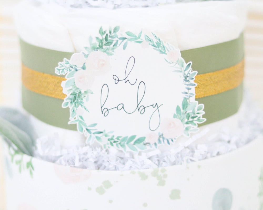 Floral Greenery Diaper Cake - a beautiful, eco-friendly baby shower gift made of diapers and adorned with greenery.