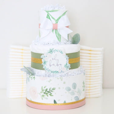 Floral Greenery Diaper Cake - a beautiful, eco-friendly baby shower gift made of diapers and adorned with greenery.