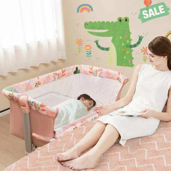 Folding Baby Bassinet Bedside Sleeper with 4 Adjustable Heights-Pink Bassinets & Bedside Sleepers