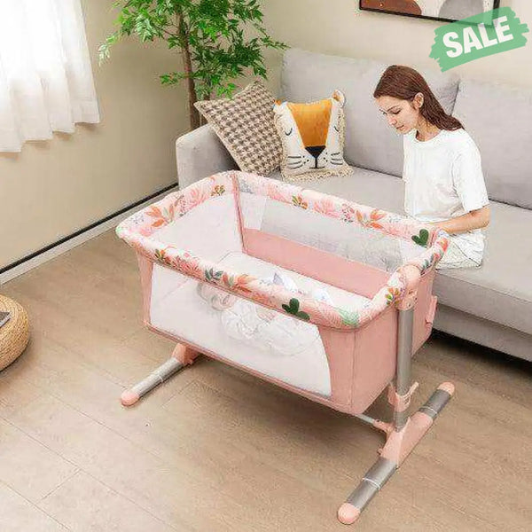 Folding Baby Bassinet Bedside Sleeper with 4 Adjustable Heights-Pink Bassinets & Bedside Sleepers